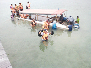 Close call for 16 teachers as boat leaks